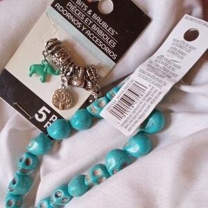 Turquoise Beaded Necklace with Silver Charms